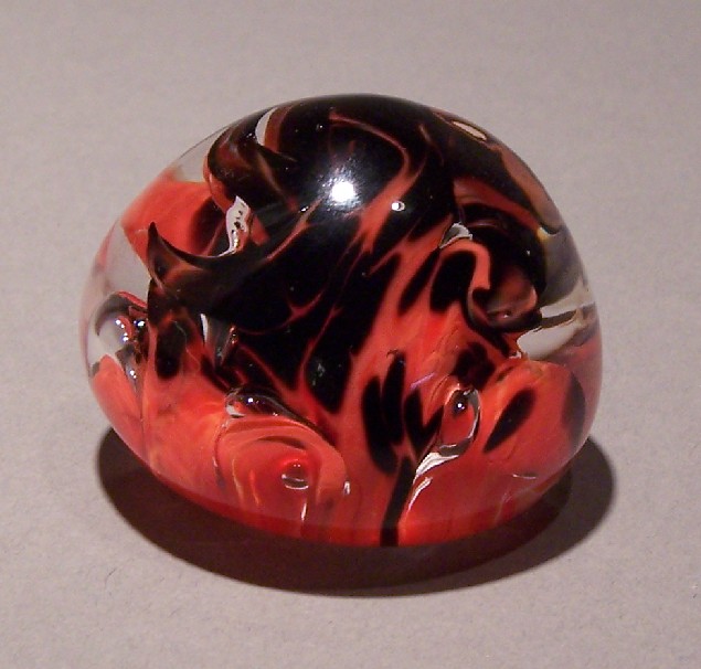 red and black paperweight