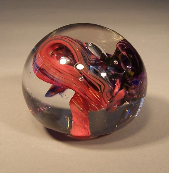 red and blue swirl paperweight
